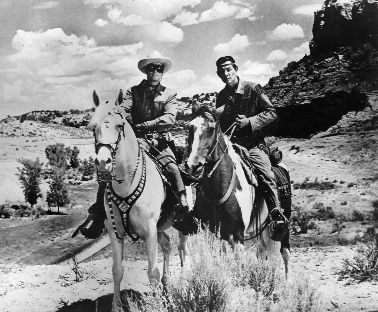 Clayton Moore and Jay Silverheels as the Lone Ranger and Tonto