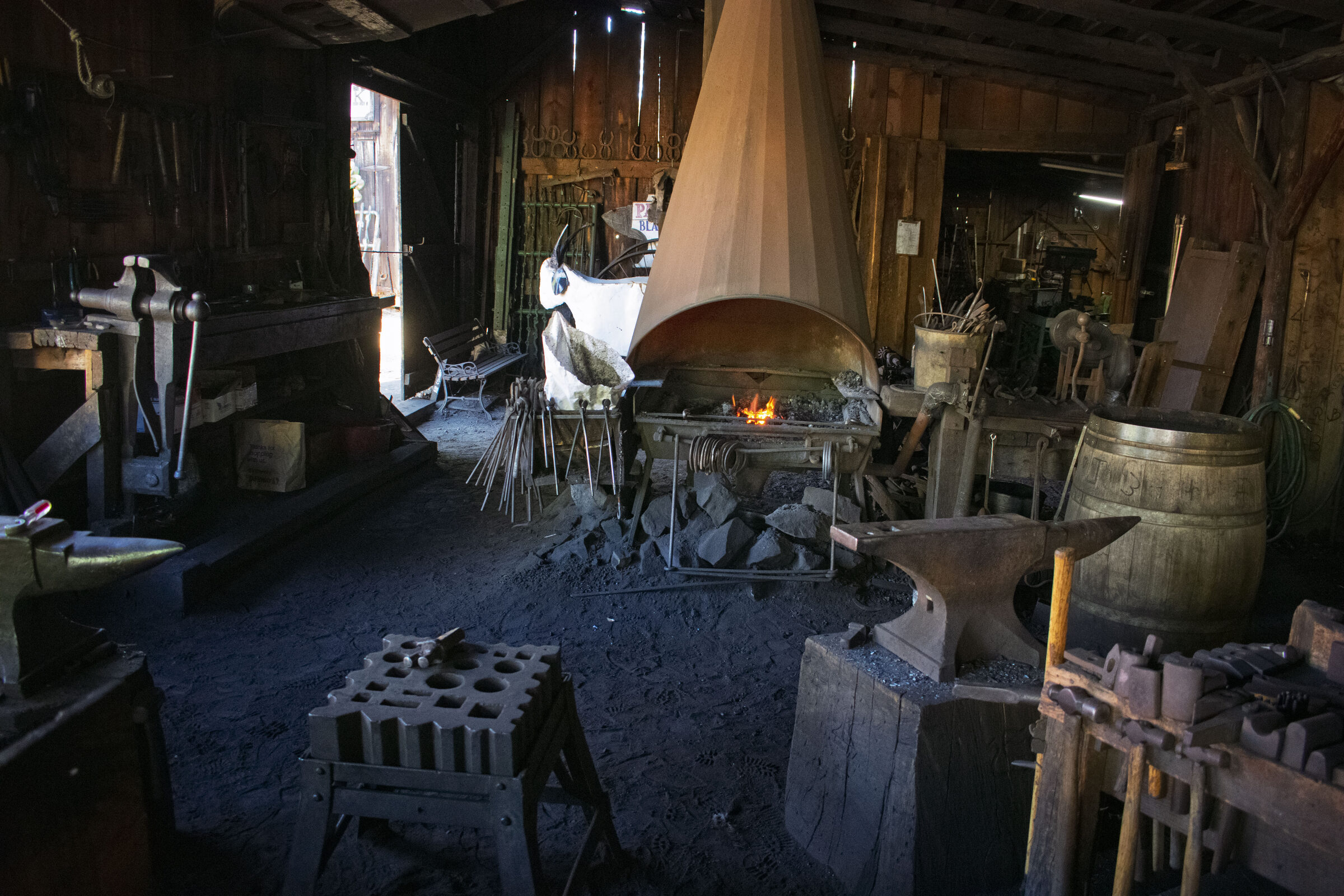 The forge, anvils and tools inside the blacksmith shop in Columbia State Historic Park
